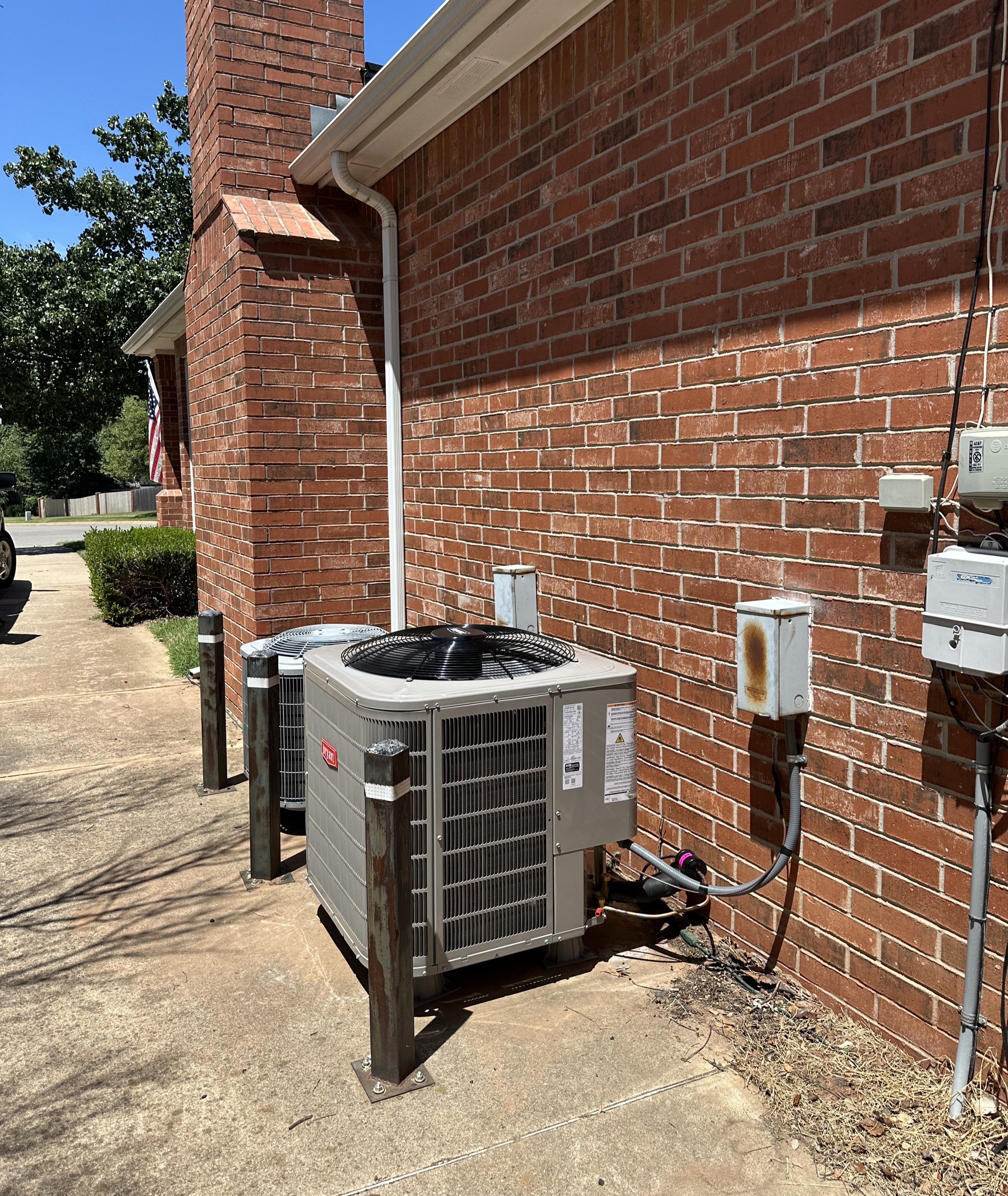 Wall-mounted air conditioning unit installed in a stylish interior with decorative ceiling molding, providing efficient cooling.