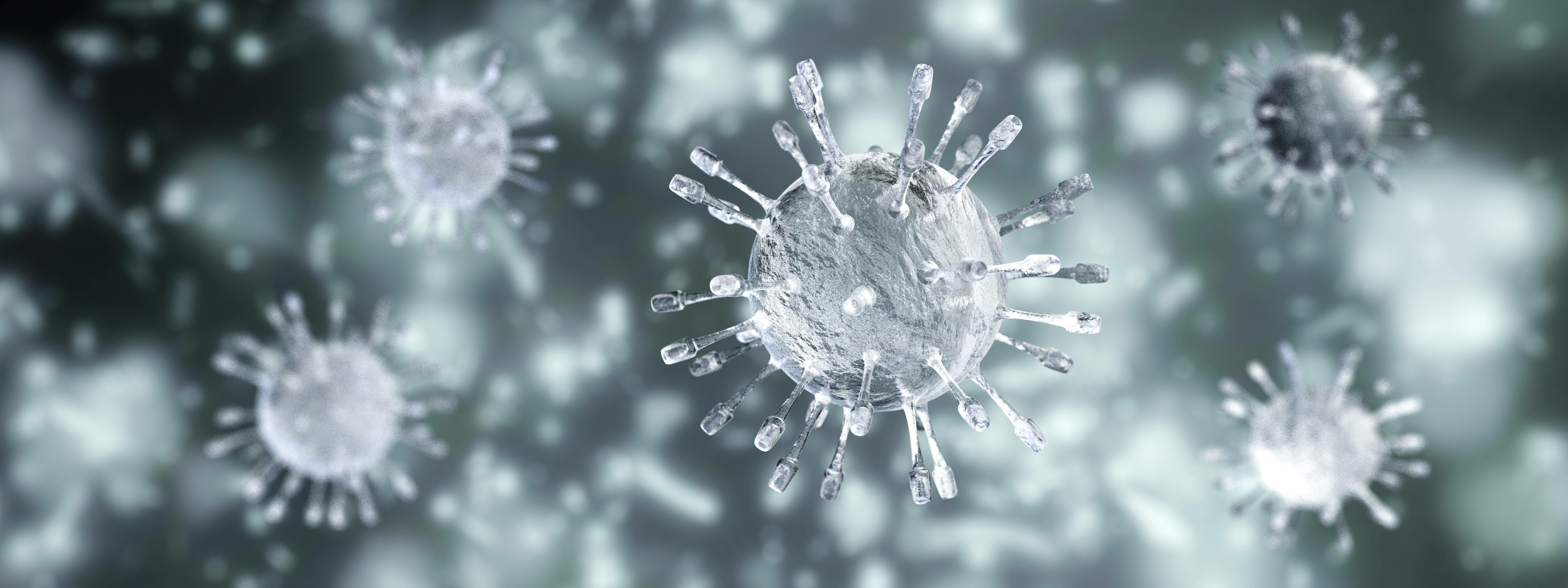 Two outdoor central air conditioning units installed on concrete pads next to a building, ready for operation.